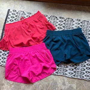 Stylish Women's Shorts Athletic Style - Red, Pink, and Teal
Size XL